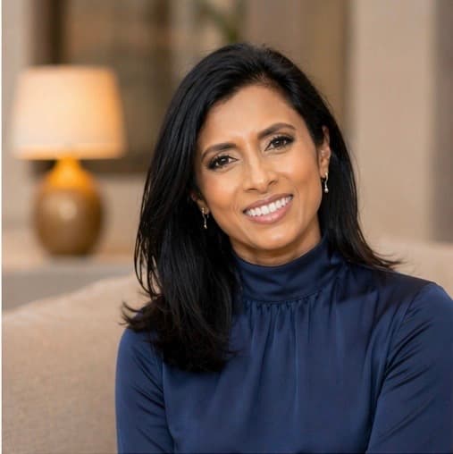 Portrait of Armi Noorata with warm bokeh background